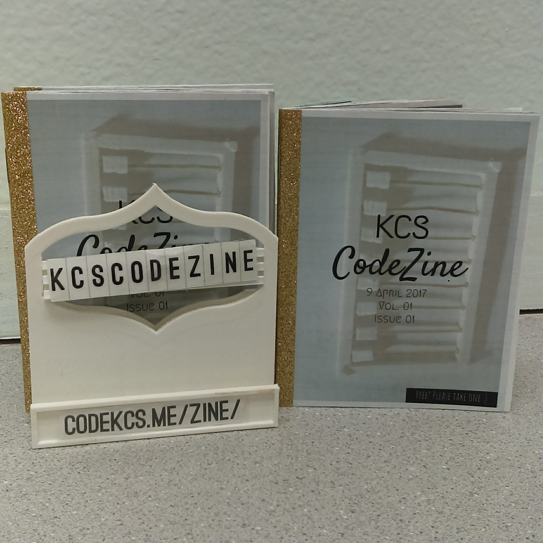 Printed copies of the KCS Code Zine.